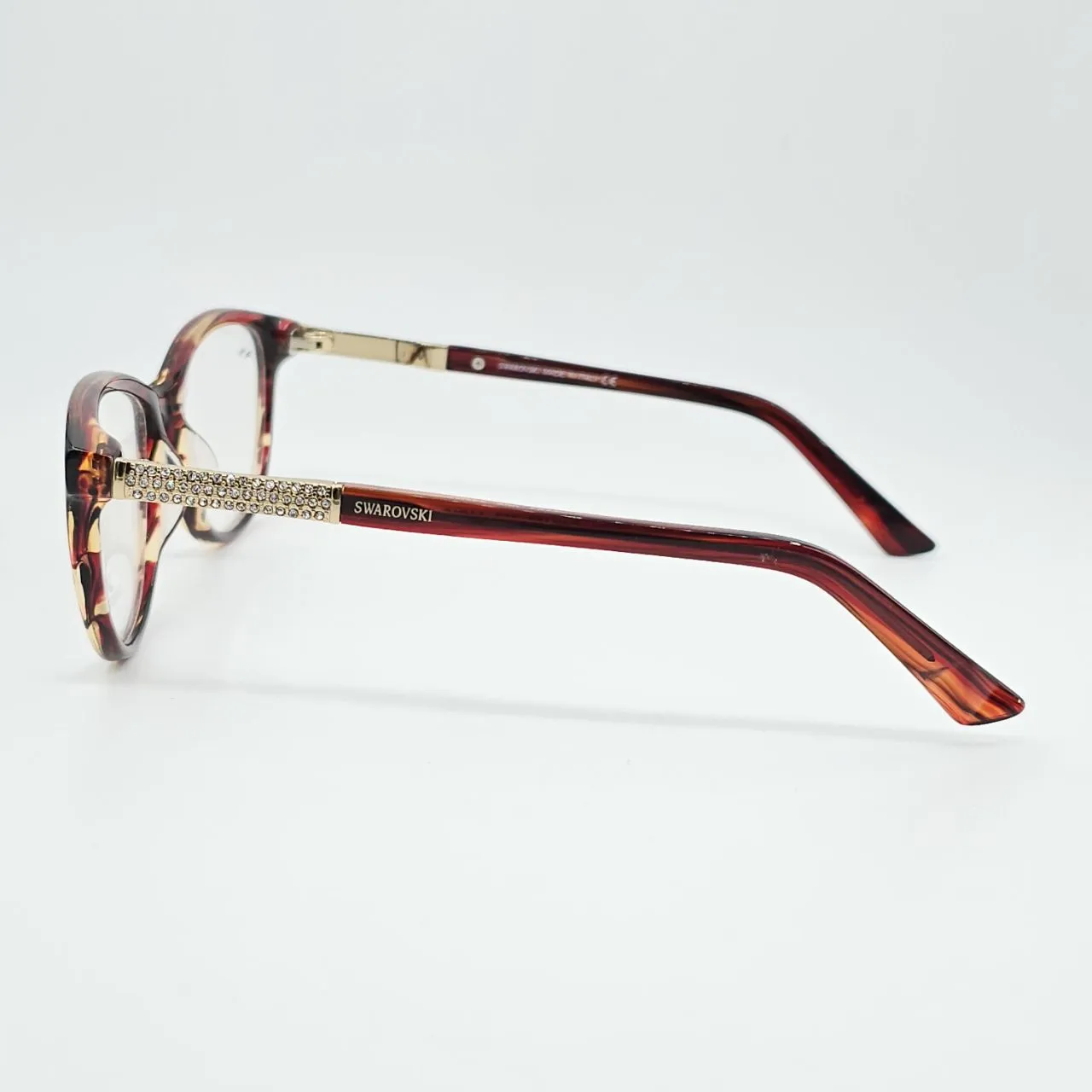 عکس نمای دسته عینک زنانه SWAROVSKI با طراحی کلاسیک رنگ red,leopard
