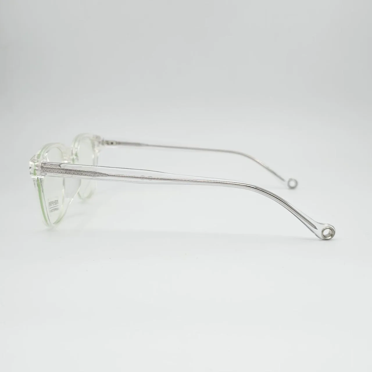 عکس نمای دسته عینک طبی شفاف TR90 برند MOSCOT رنگ transparent
