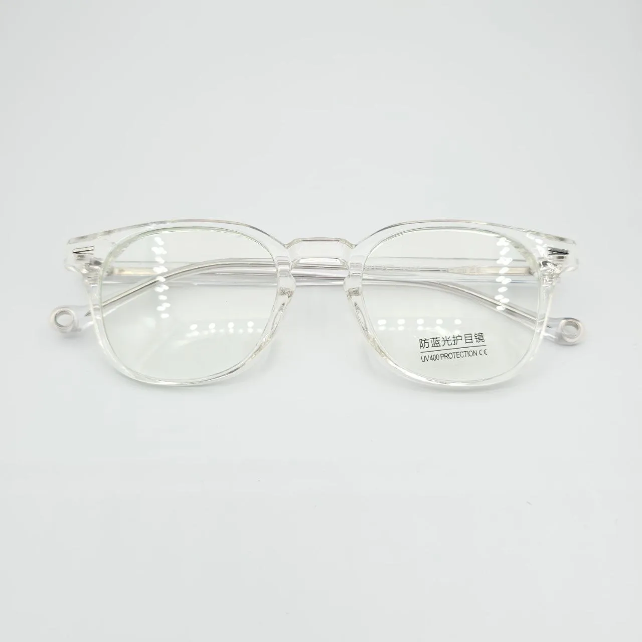 عکس نمای از بالا عینک طبی شفاف TR90 برند MOSCOT رنگ transparent
