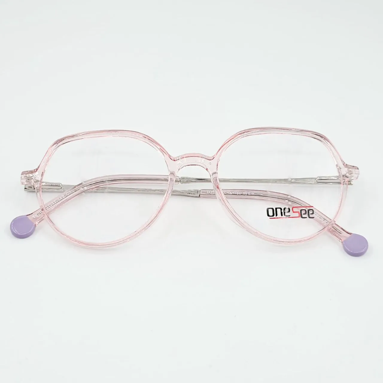 عکس نمای از بالا فریم عینک طبی شفاف صورتی زنانه کائوچو one see رنگ pink