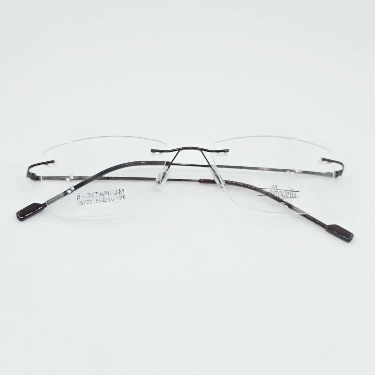 عکس نمای دسته عینک طبی بدون فریم Silhouette رنگ brown