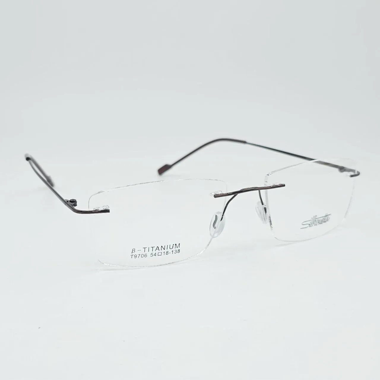 عکس نمای 45 درجه عینک طبی بدون فریم Silhouette رنگ gray