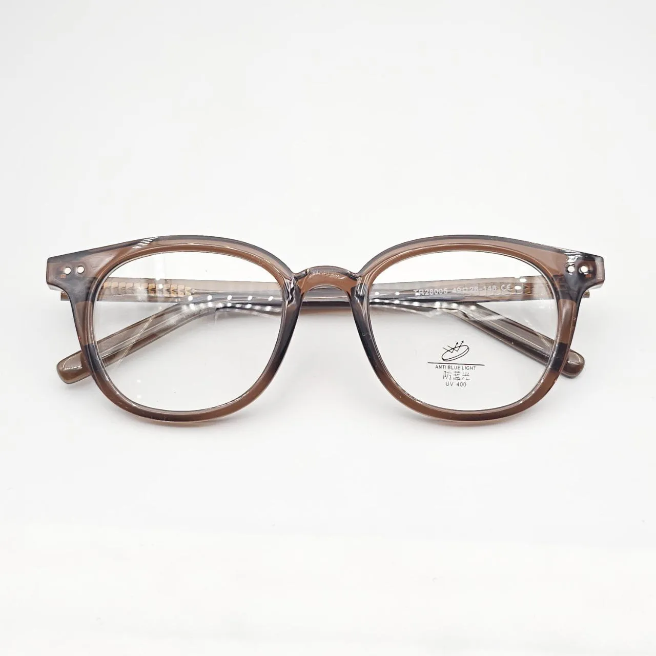 عکس نمای از بالا عینک طبی نشکن برند MOSCOT رنگ brown
