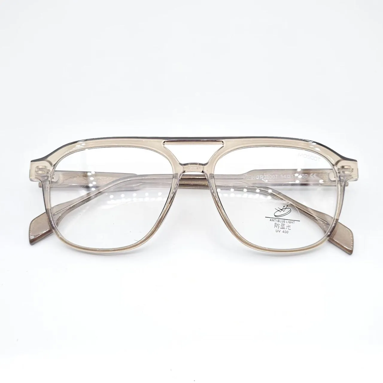 عکس نمای از بالا عینک طبی نشکن برند MOSCOT رنگ brown
