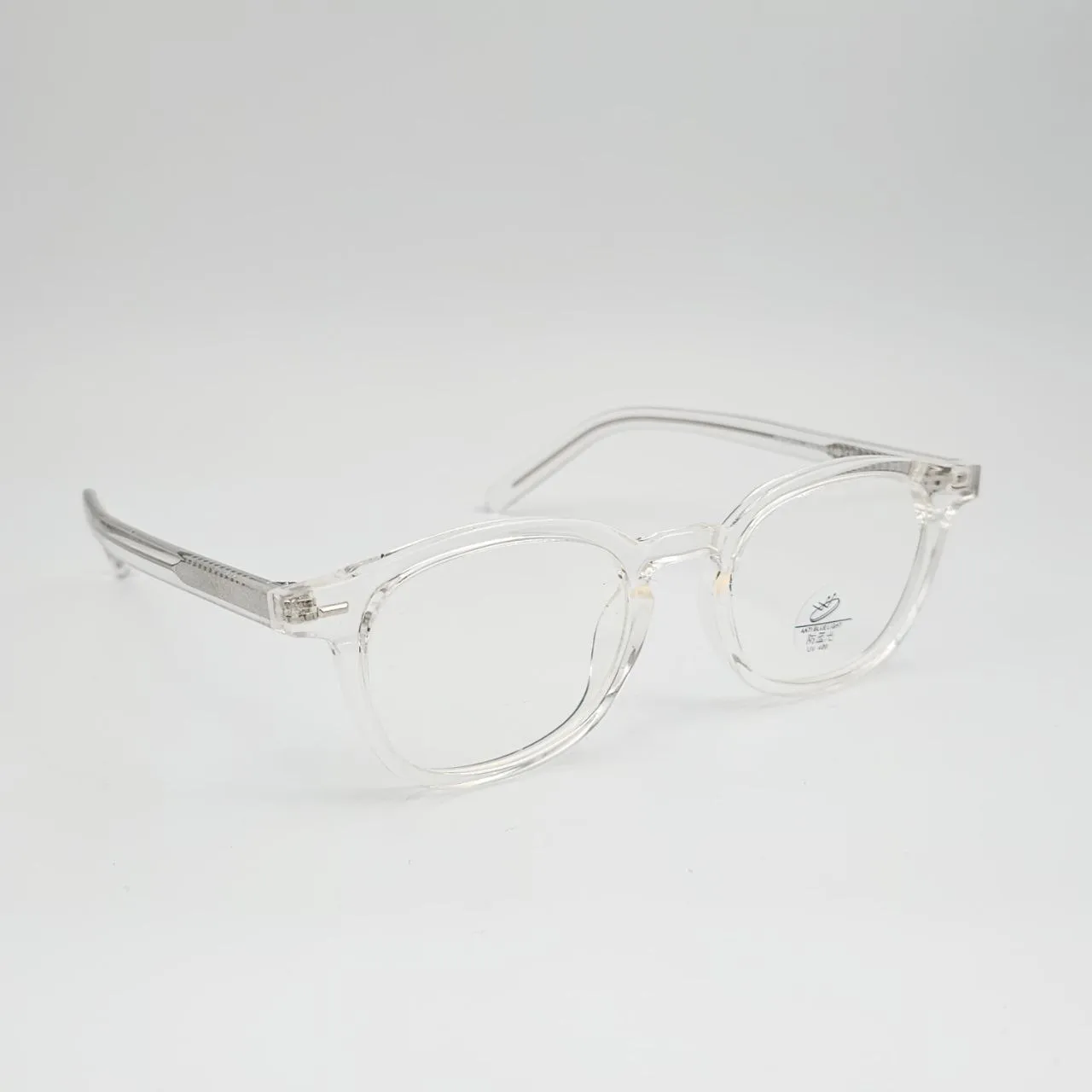 عکس نمای 45 درجه عینک طبی شفاف TR90 برند MOSCOT رنگ transparent