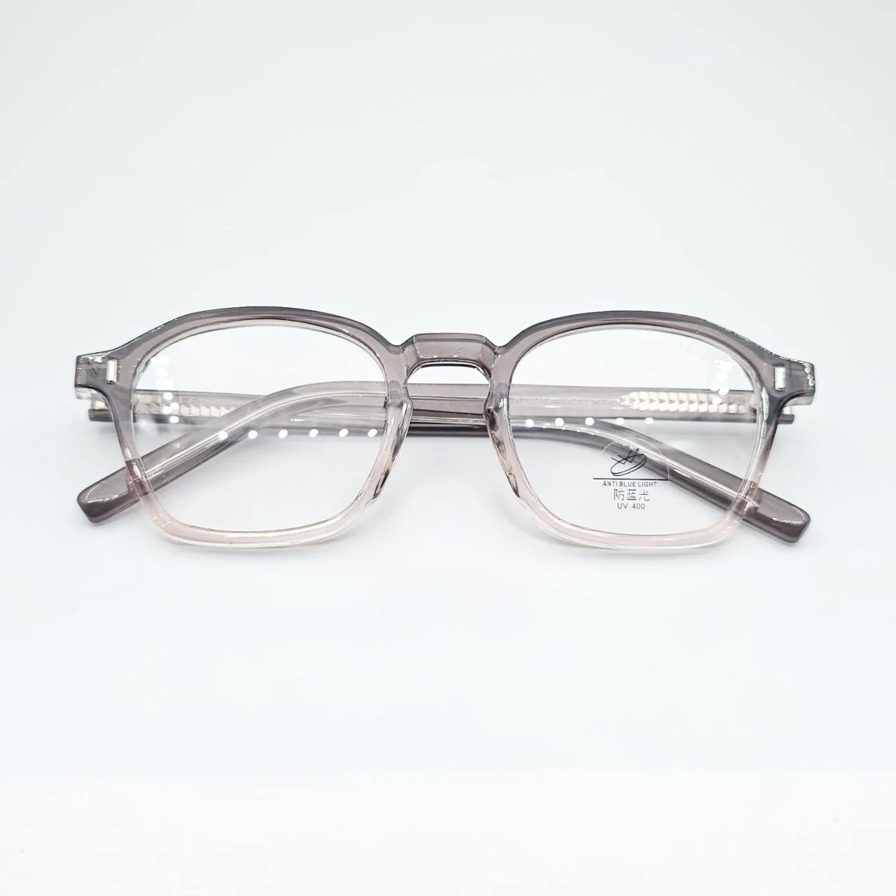 عکس نمای از بالا عینک طبی چند ضلعی TR90برند MOSCOT رنگ brown,transparent
